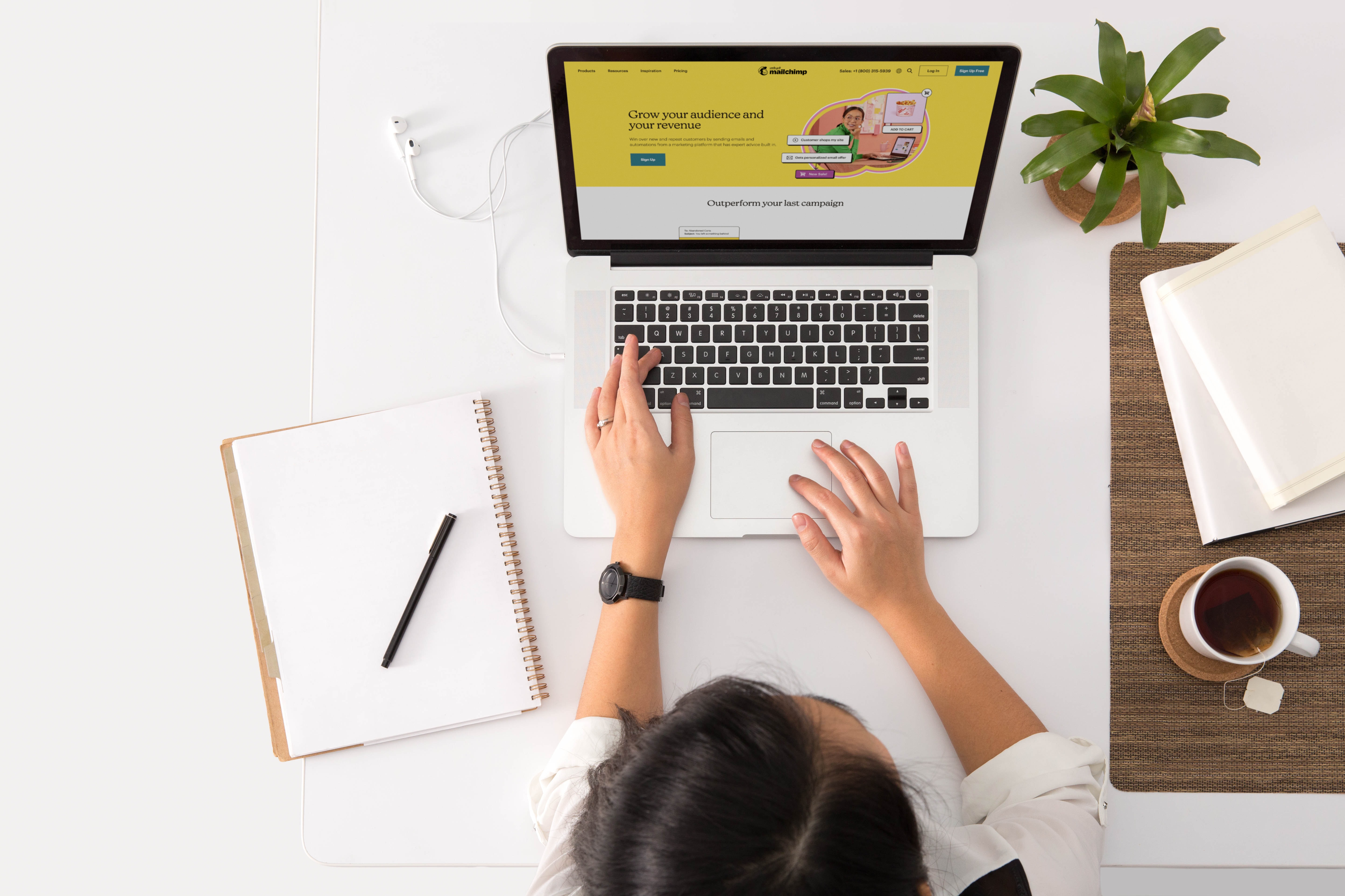 woman working on her laptop at a desk