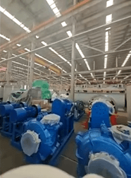 A large room with blue machines
AI-generated content may be incorrect.