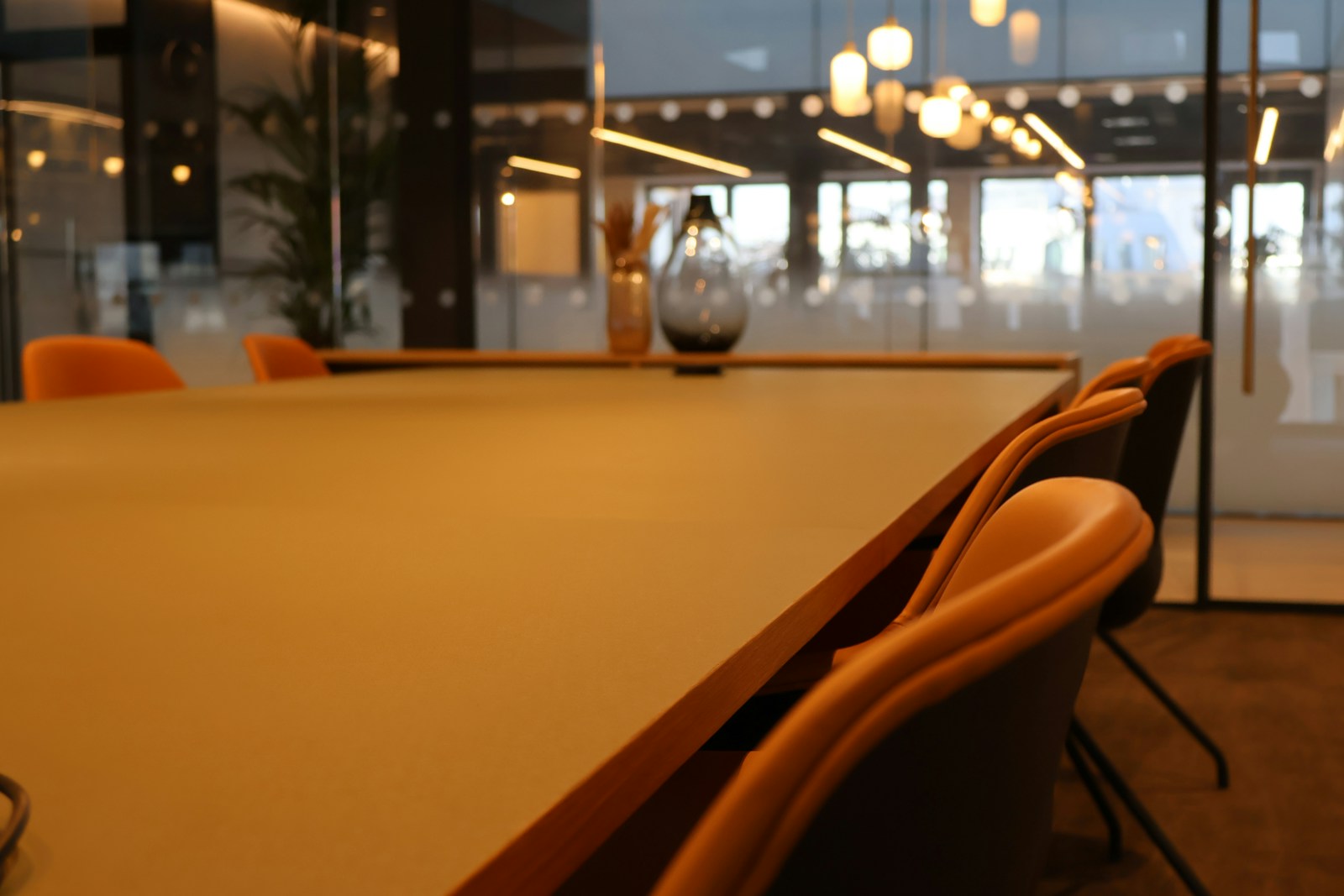 Modern compact office meeting room with glass partitions