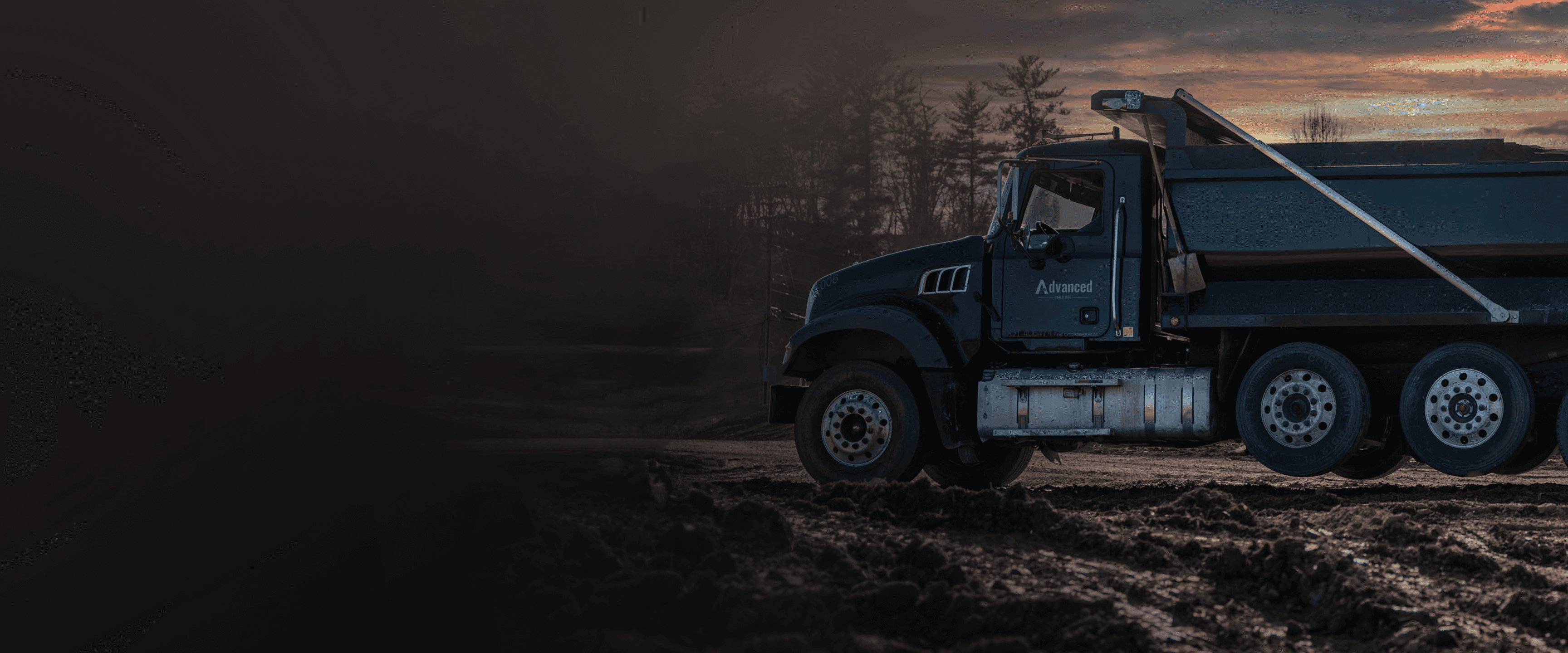 DUMP TRUCK IN THE DIRT