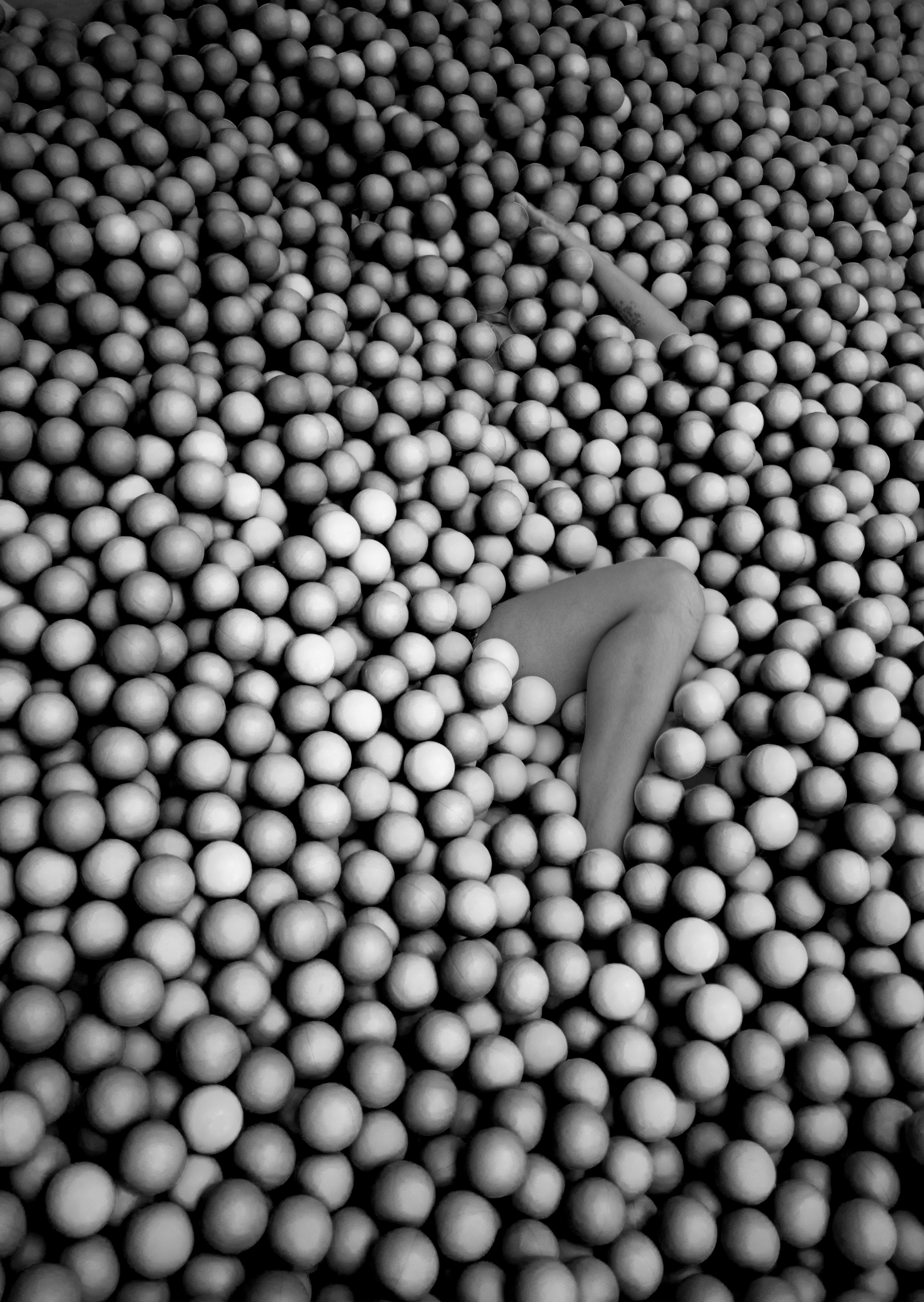 Artistic fashion portrait with colorful geometric shapes and avant-garde red styling