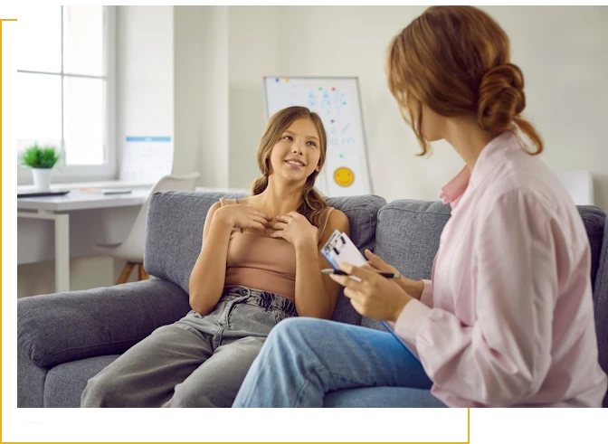 therapist meeting with teen during counseling session