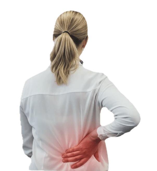 Woman at office desk holding her lower back in pain, indicating a potential workplace injury or ergonomic issue