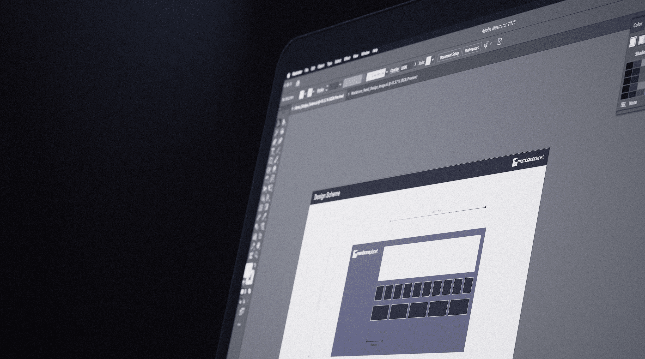Designer using Adobe Illustrator on a computer to create a custom membrane panel for a client