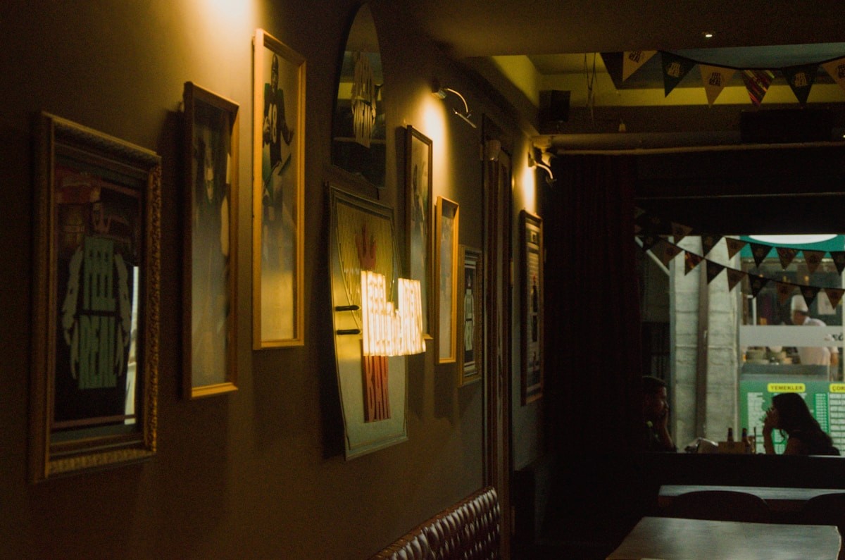 A jazz trio playing in a warm-lit room