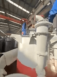 A large white and red machine
AI-generated content may be incorrect.