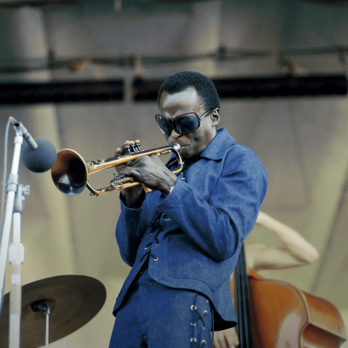 Musician Miles Davis playing the trumpet