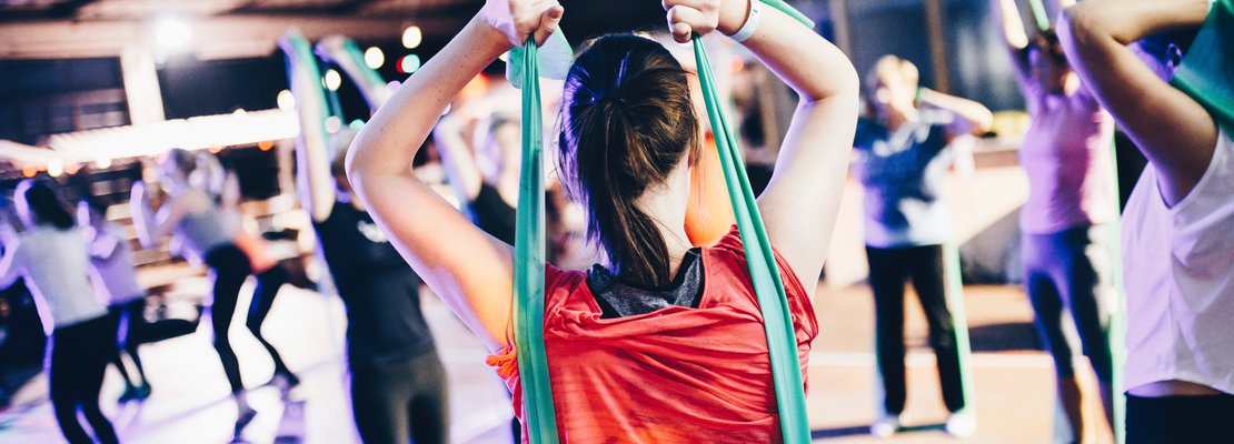 a class doing stretching