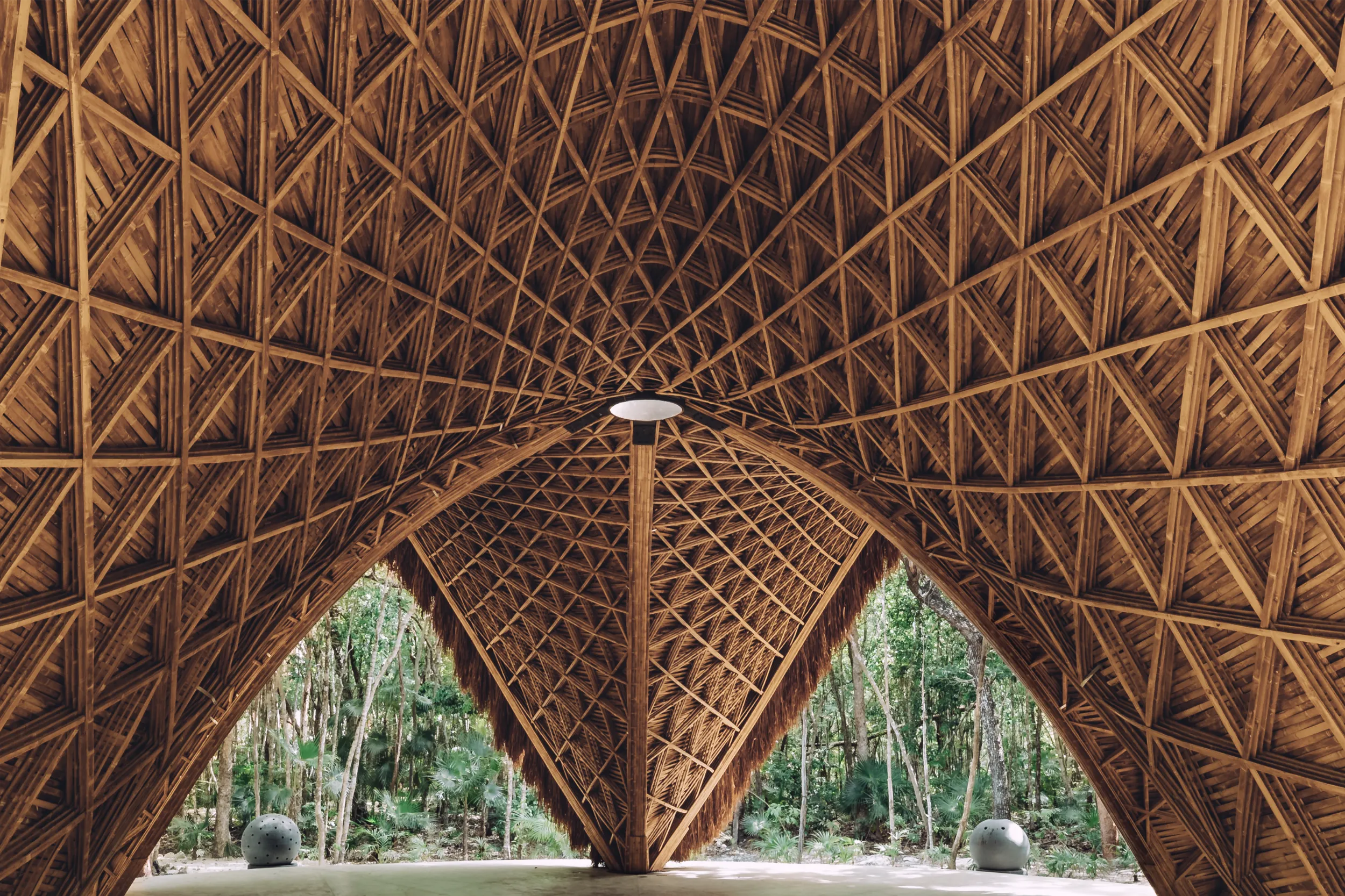 Bioparametric bamboo rooftop temple structure at Hyatt Impressions Isla Mujeres, designed by Arquitectura Mixta.