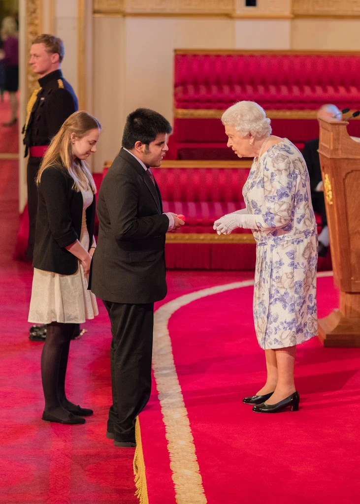 Our founder Kartik receiving the Queen's Young Leader Award from Queen Elizabeth II at Buckingham Palace.