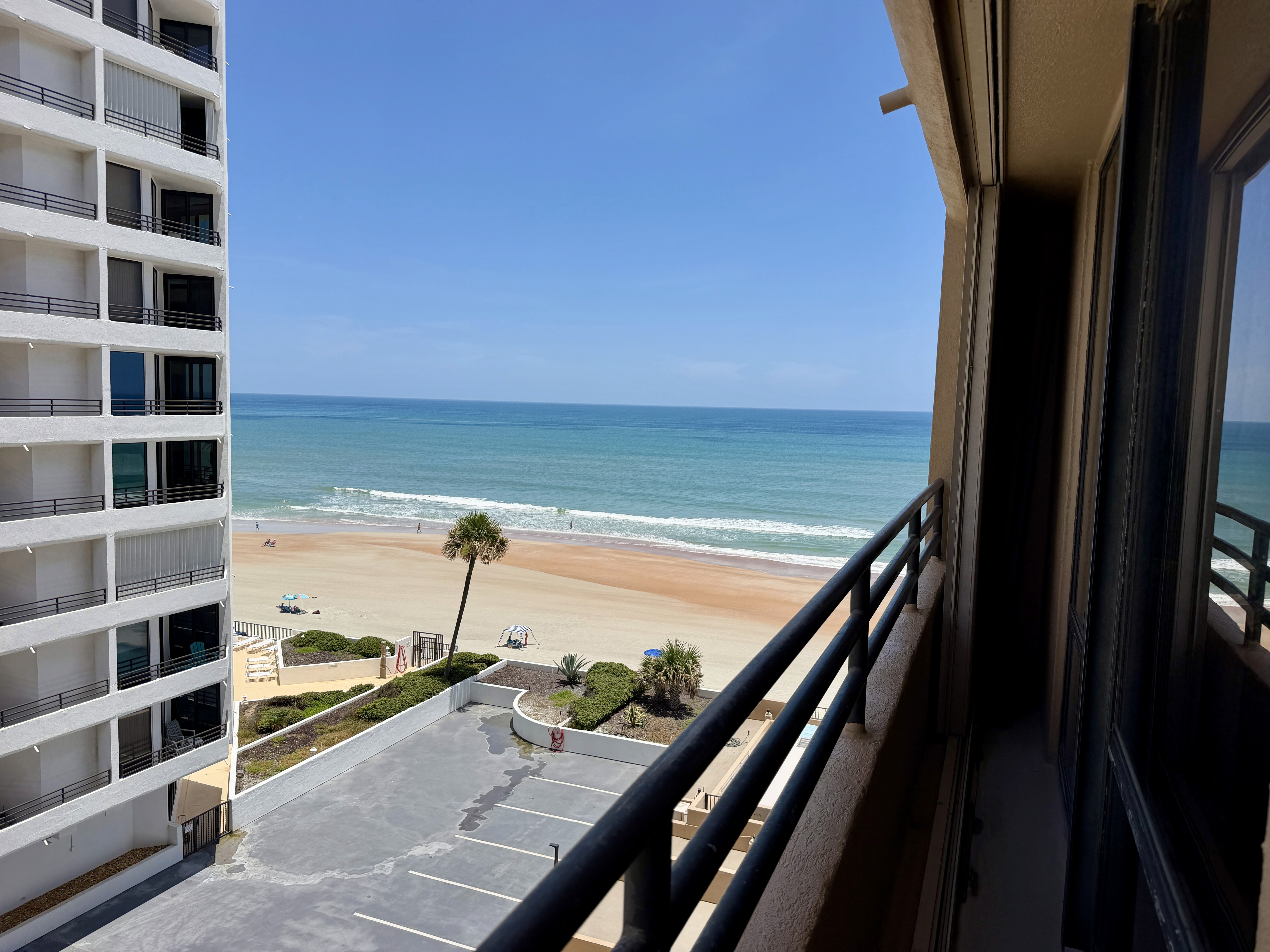 Balcony view of the ocean and beach, Unit 602 at Oceans Atrium, a vacation rental in Daytona Beach Shores