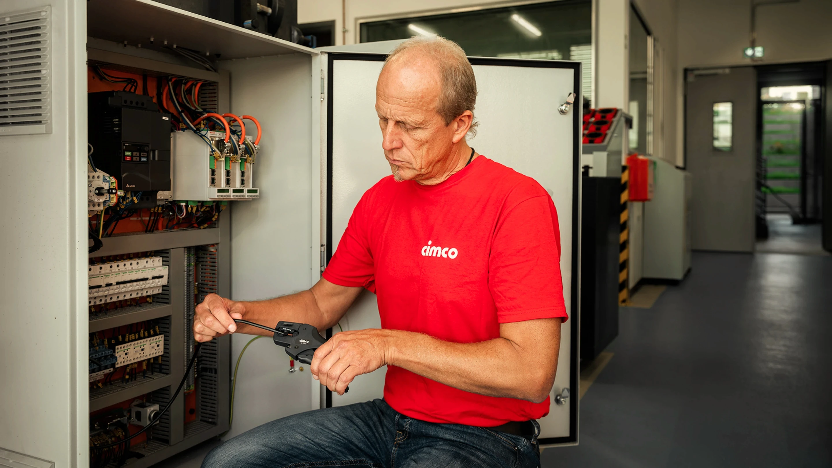 Man on electrical cabinet