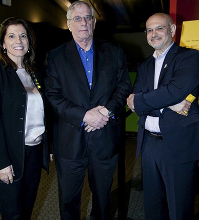 portrait of two older men and an older woman