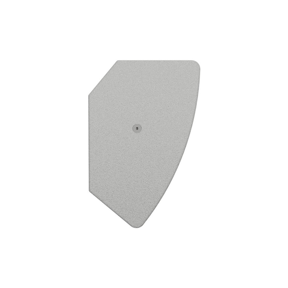 Light gray textured object with a small circle in the center.