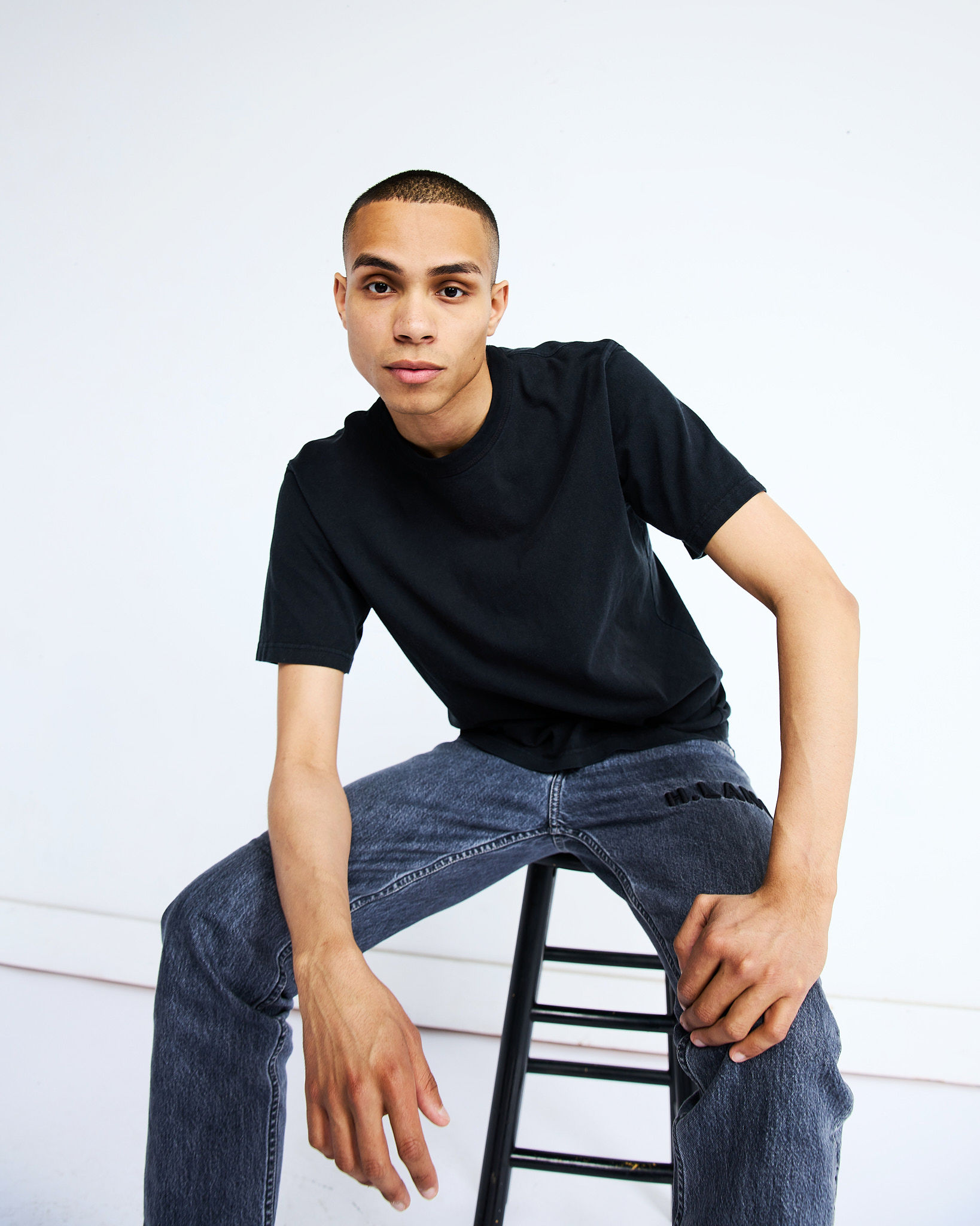 Sunlight streams through an arched window onto a ledge.