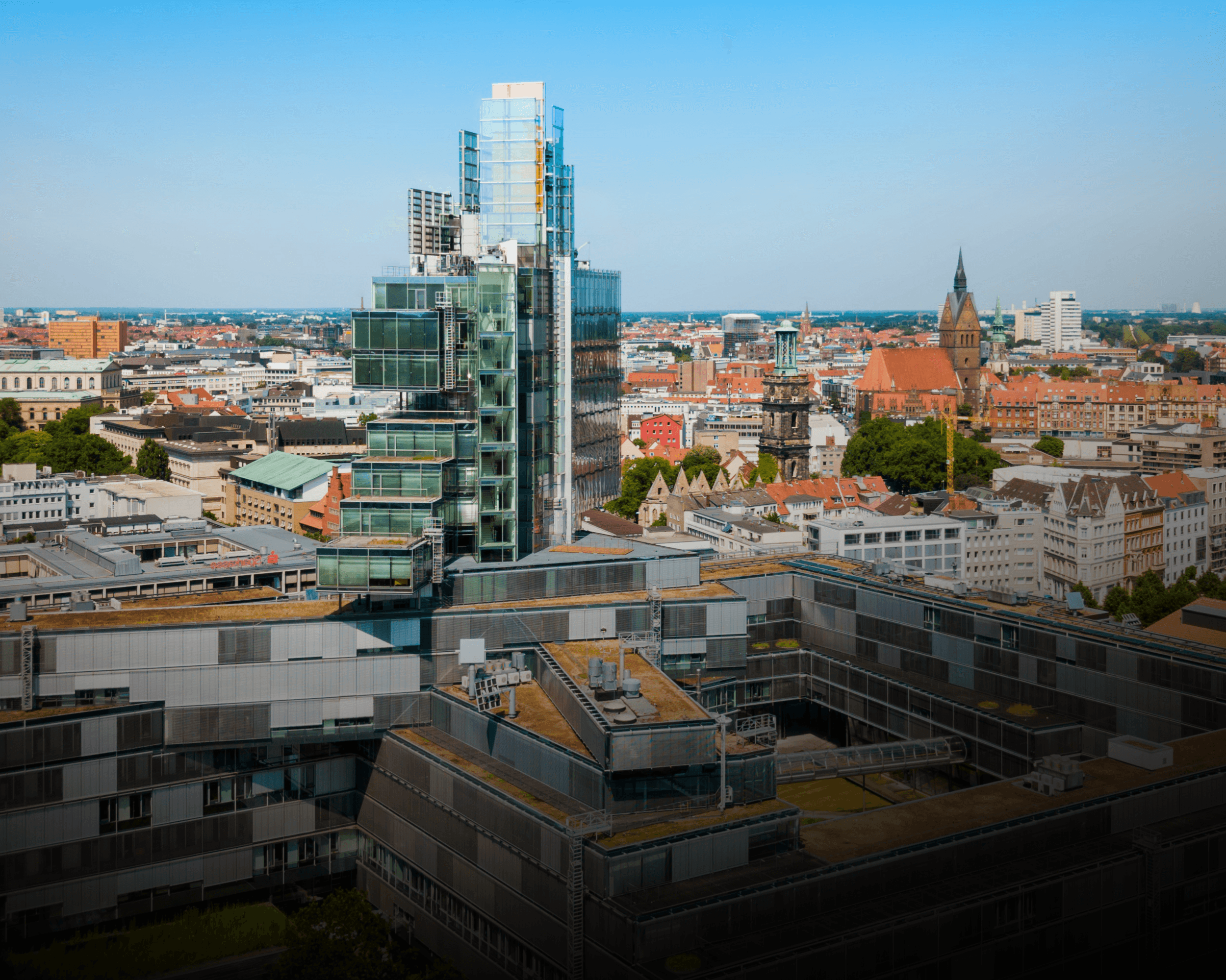 two people looking at a tablet and smiling