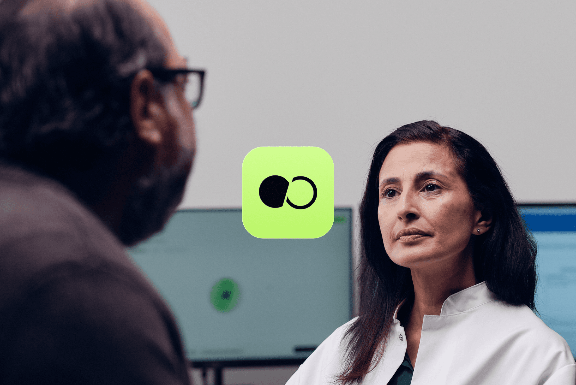 Clinic consultation with Tandem logo overlay