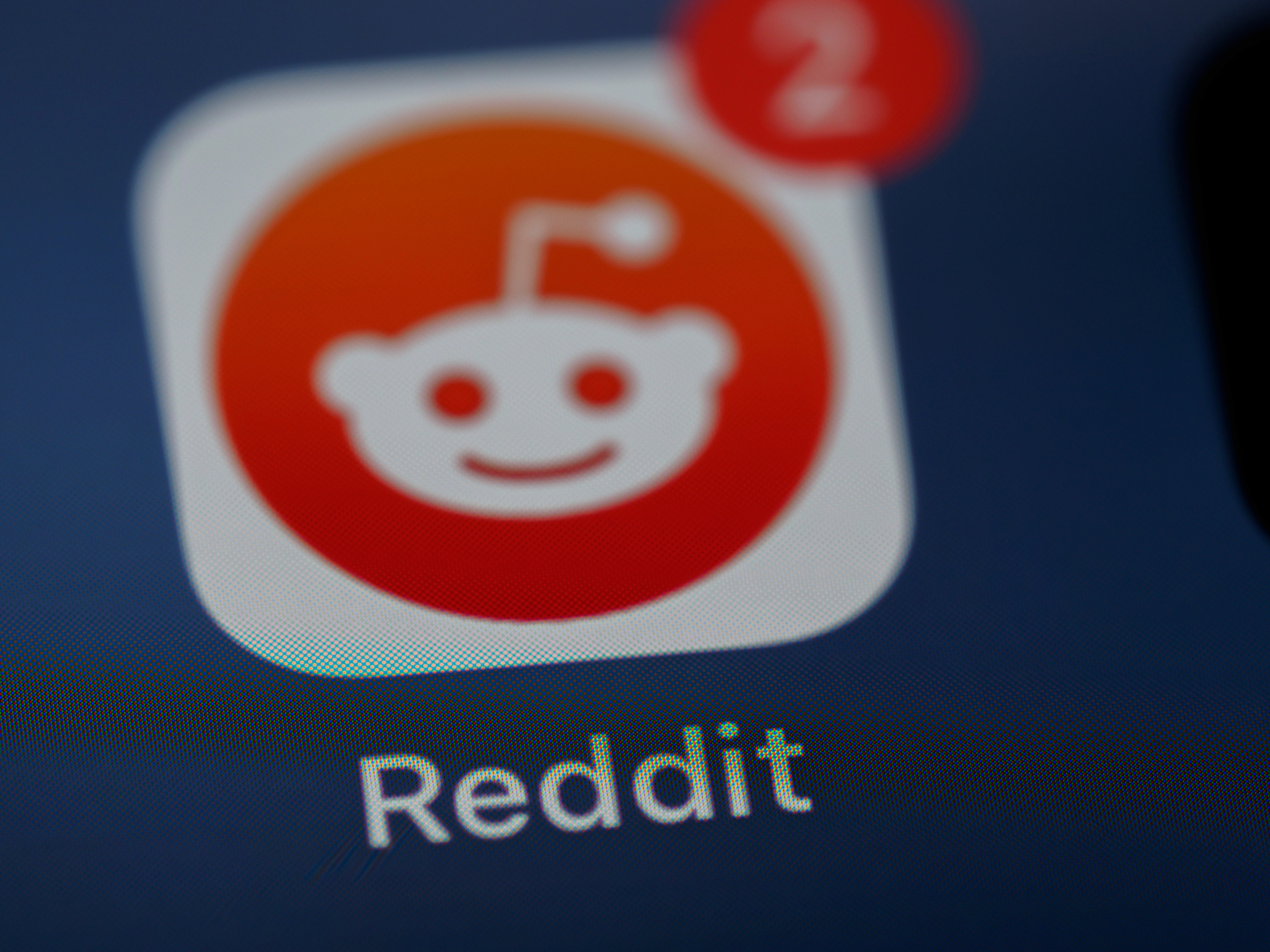 Reddit app on phone with notification - reddit sentiment analysis