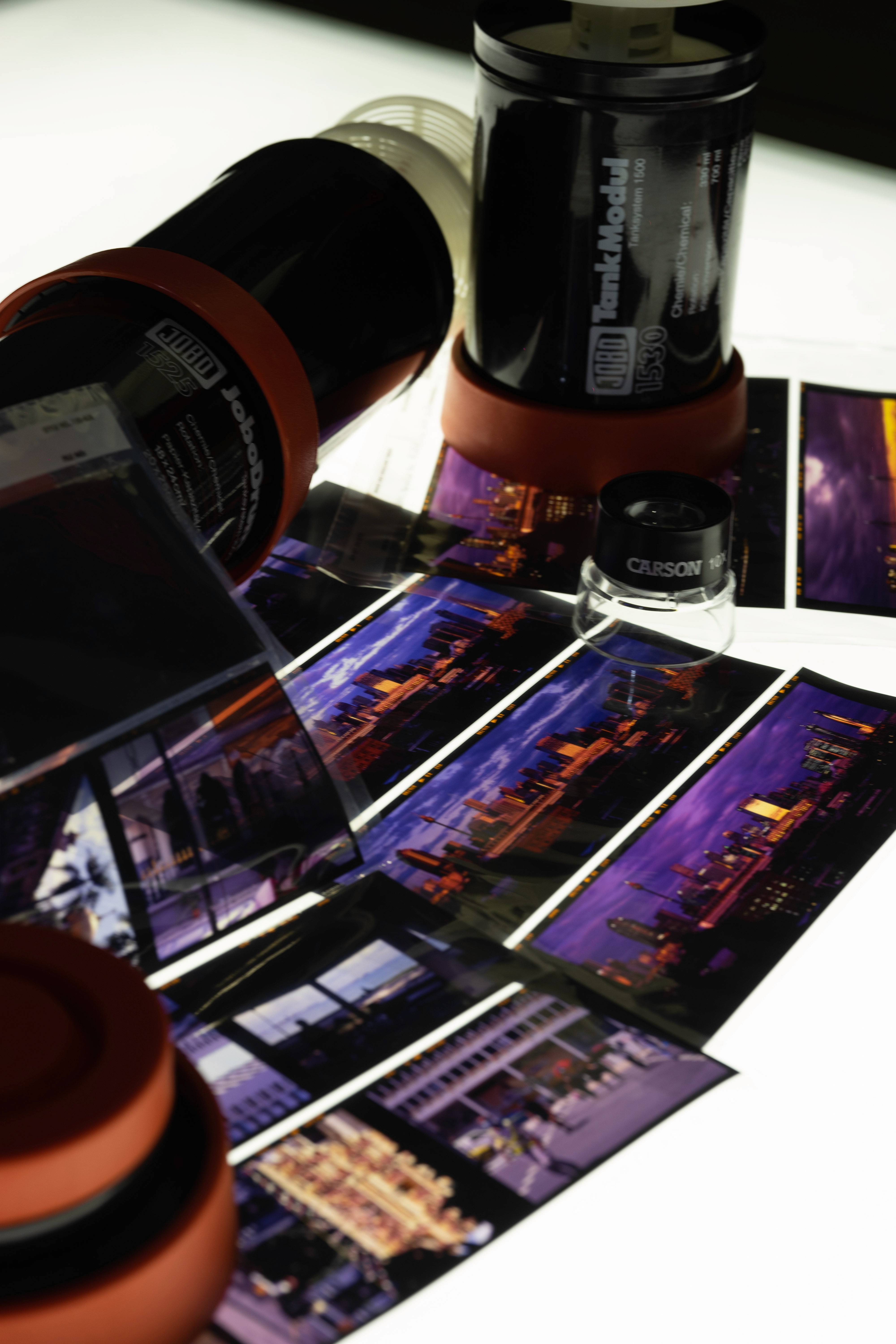 E6 film slides on light table at brunswick darkroom