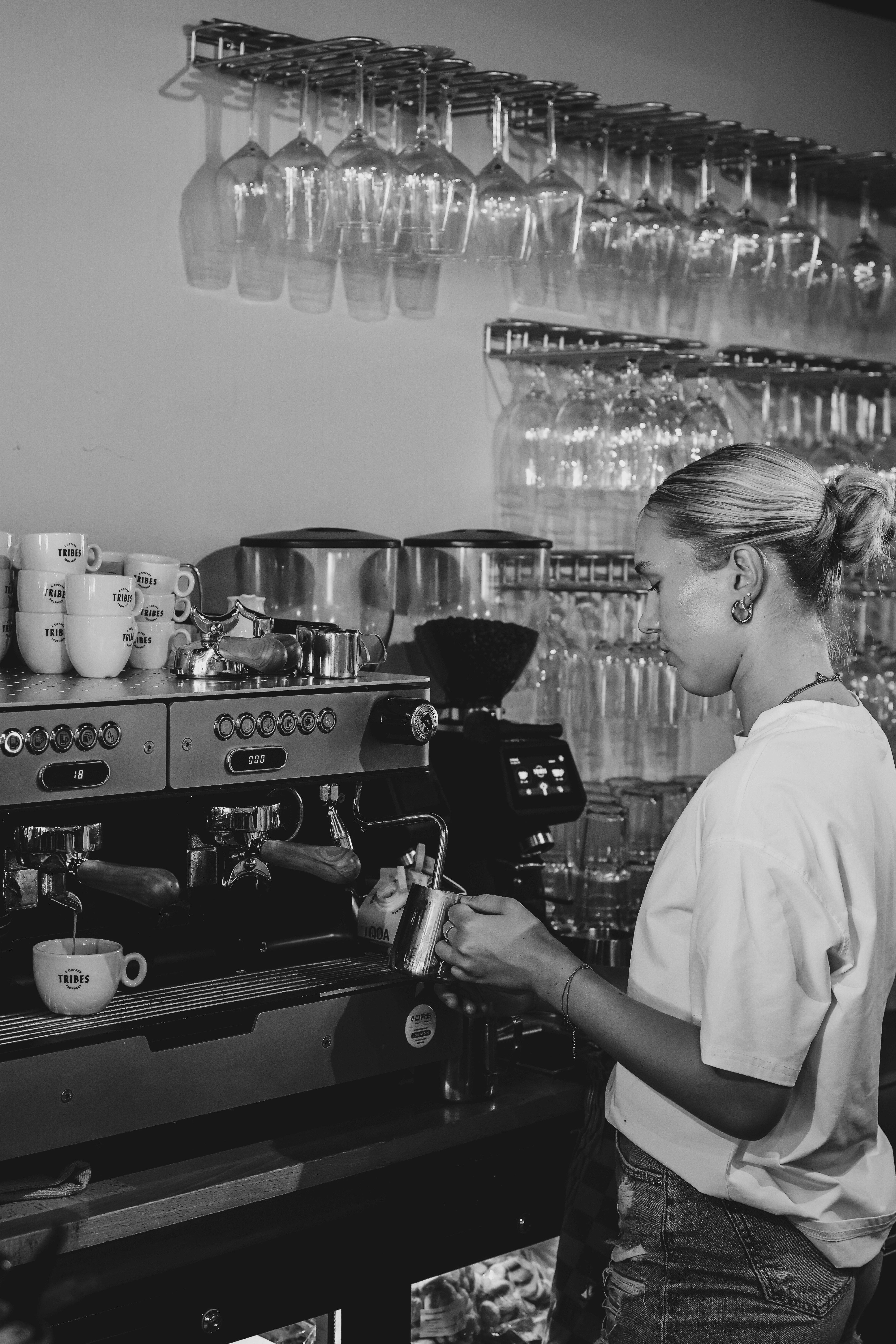 barista making coffee