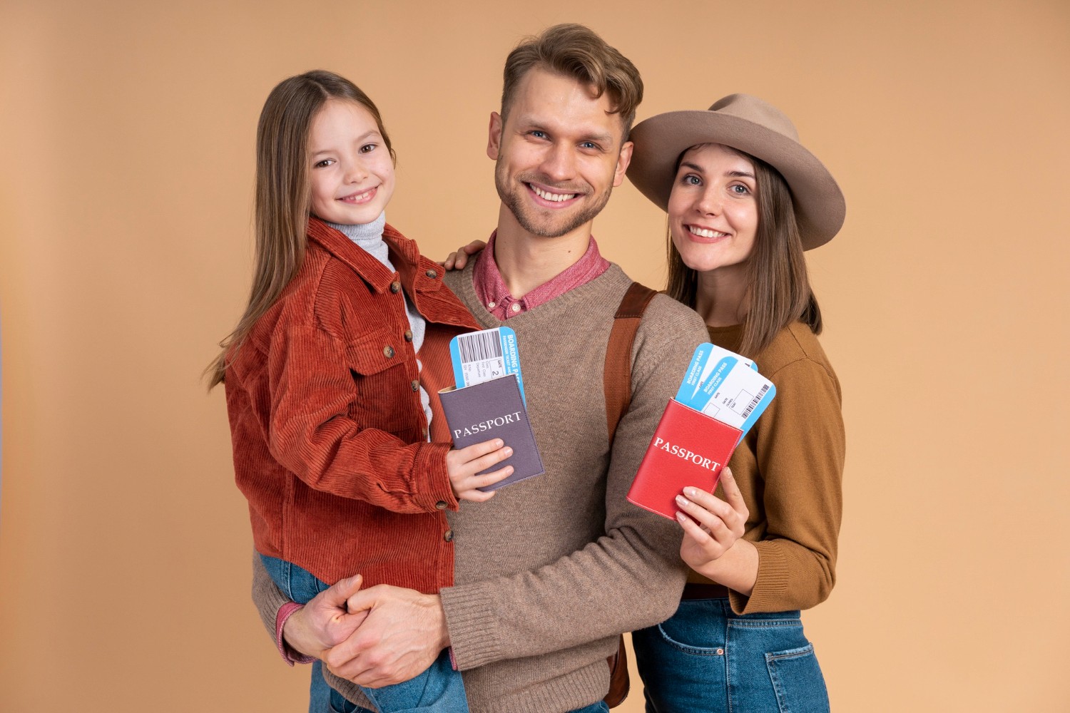 Happy family with passports and boarding passes