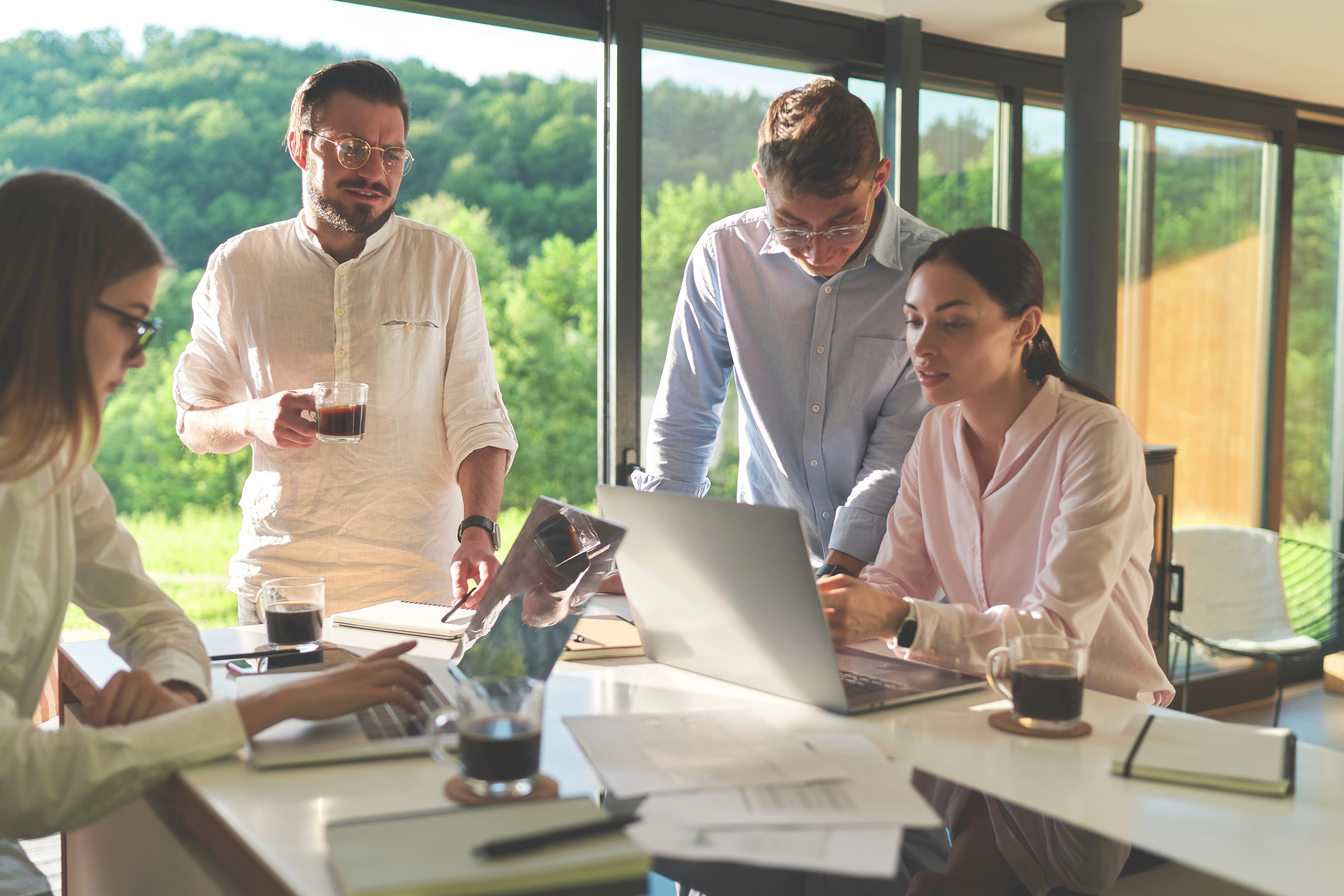 Financial professionals collaborating on lending and investment strategy.