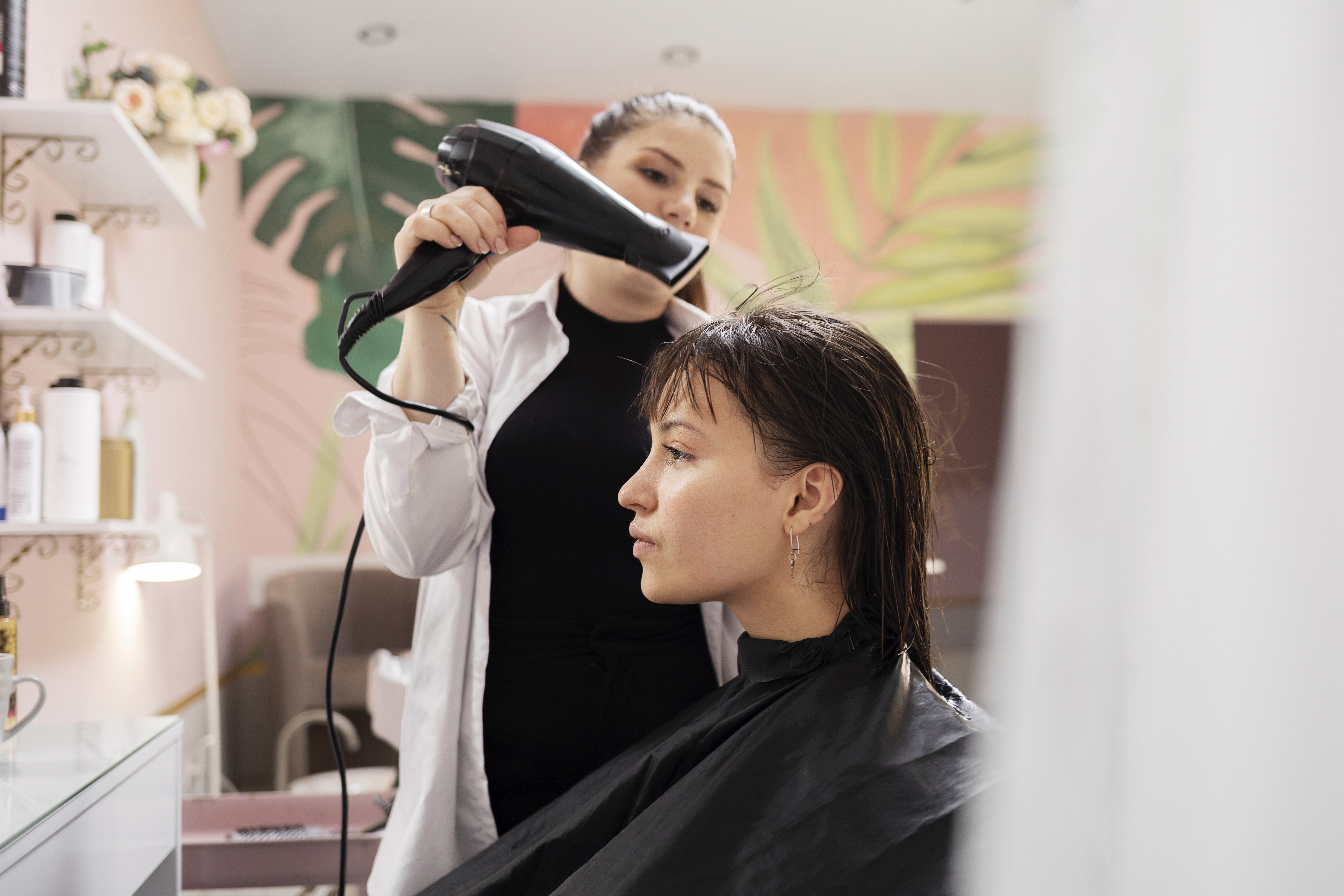 A woman getting a salon makeover