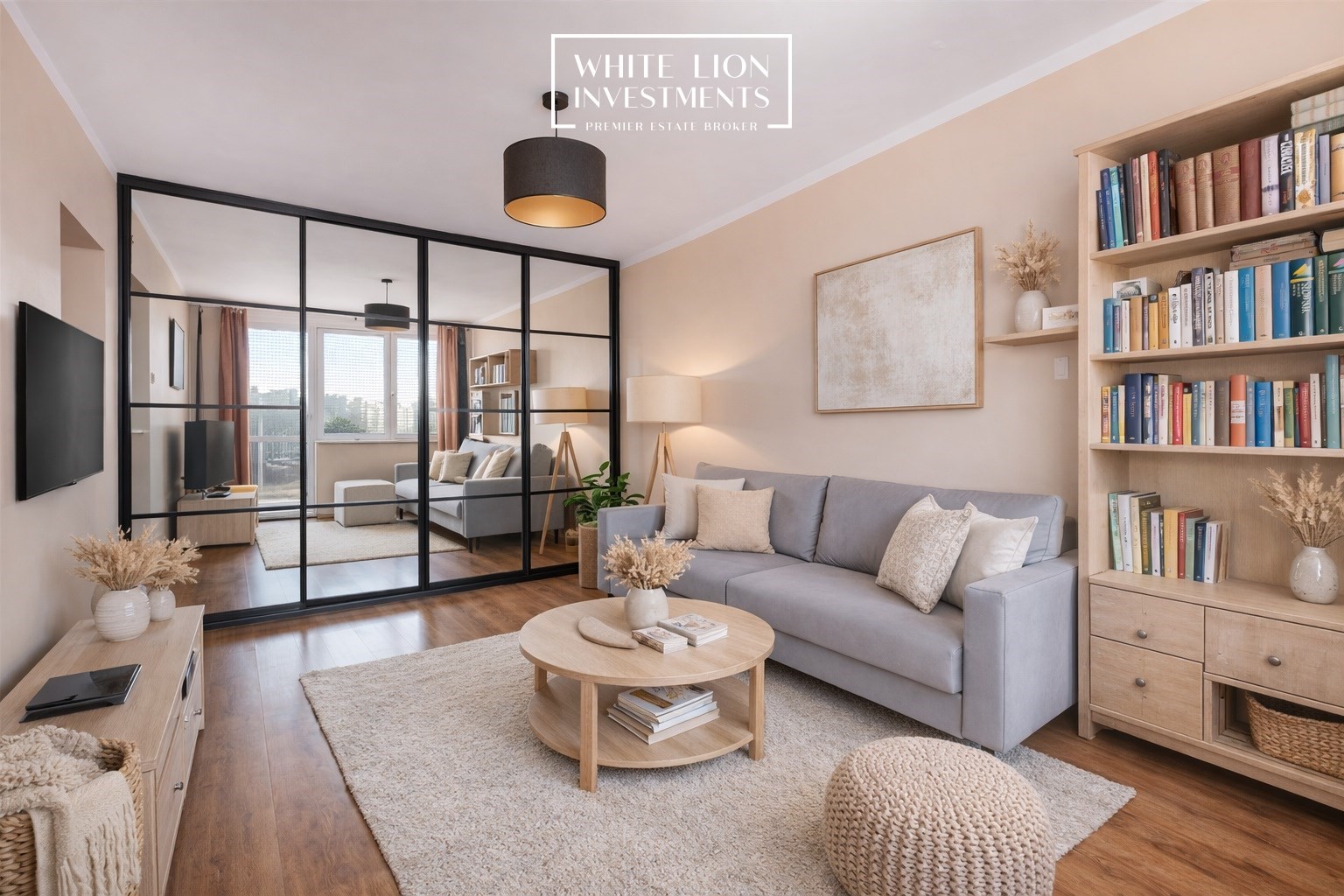 wnętrze małego mieszkania, kanapa, szafa, komoda, półka z książkami