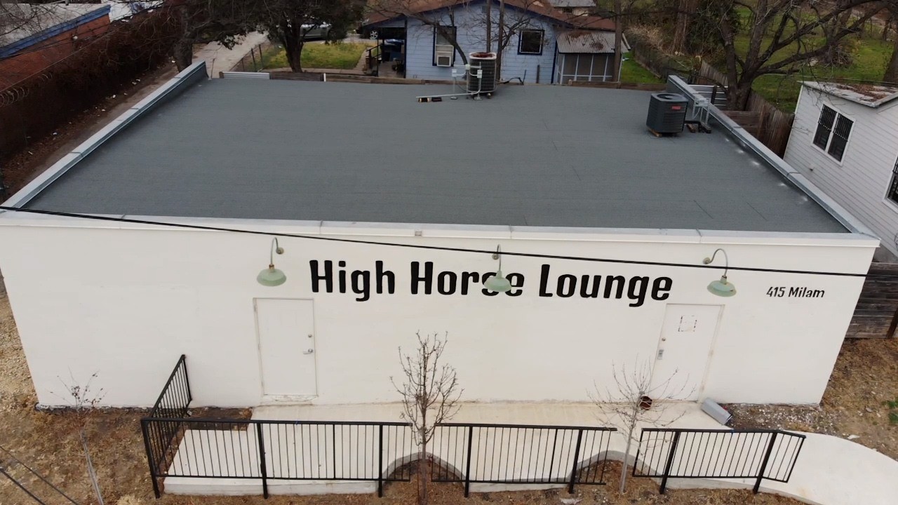 Completed modified-bitumen work at High Horse Lounge. This example is not a diagnosis of another building.