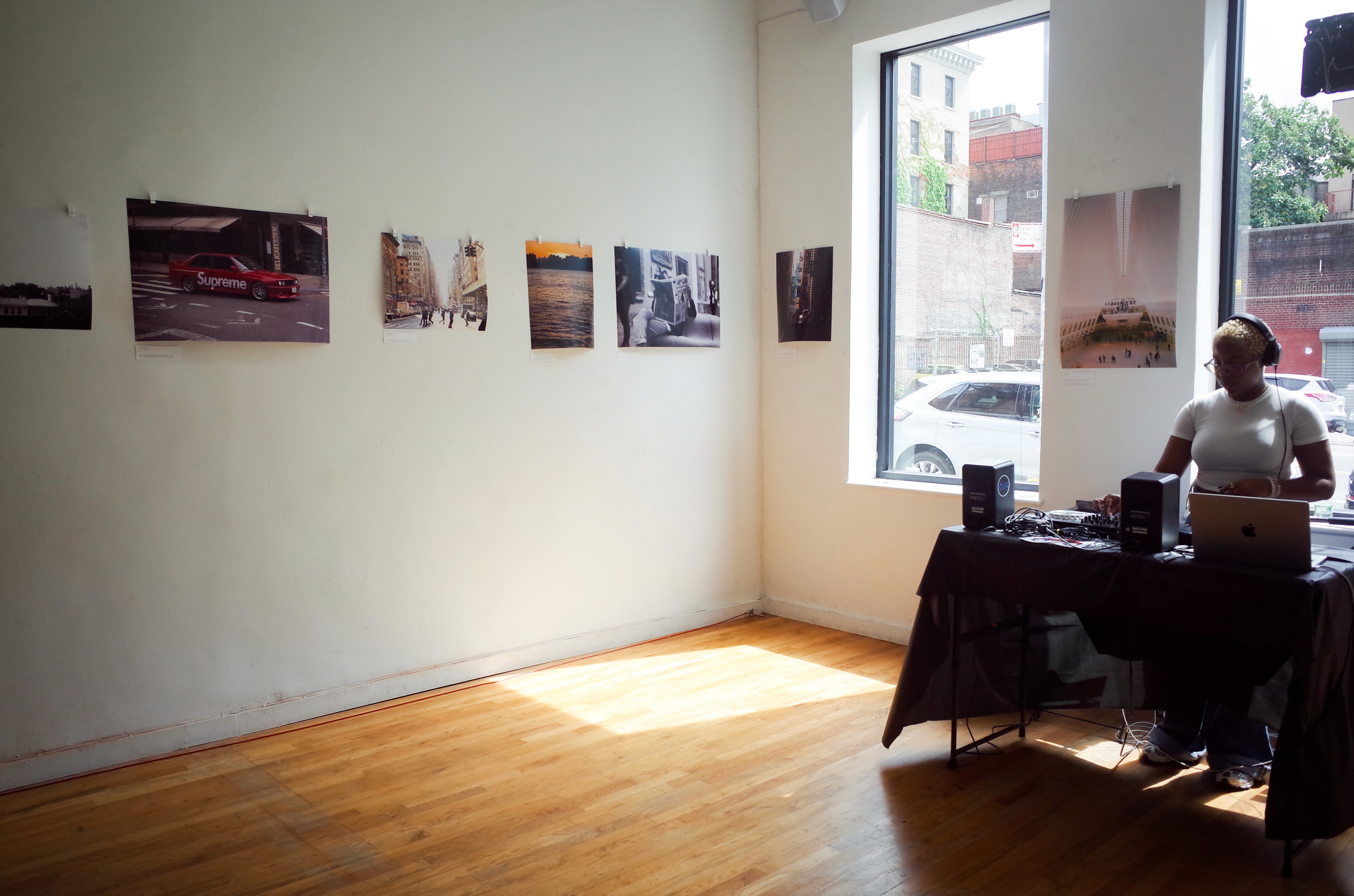 Ten To One Rum bottle next to a cocktail menu card on a table during the gallery event.