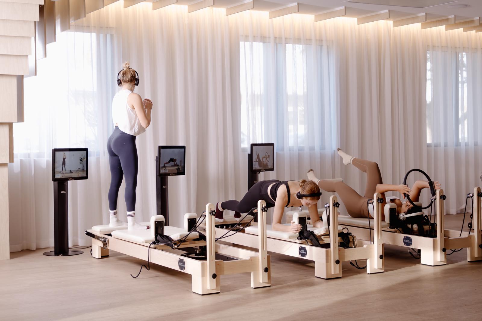 a white room with mirrors and equipment in it