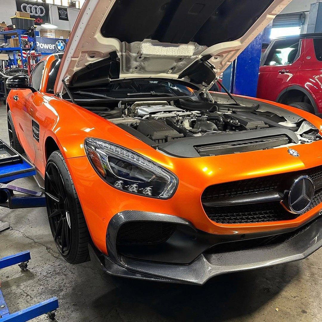 Orange Mercedes auto repair shop