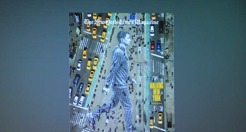 the new york times magazine cover with a man composed of vertical stripes painted on the road