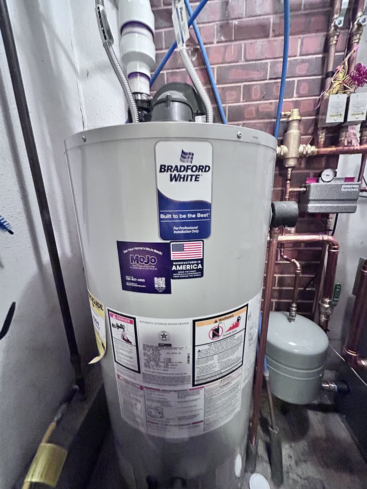 Brian and Hunter with MoJo Home Service truck in the background
