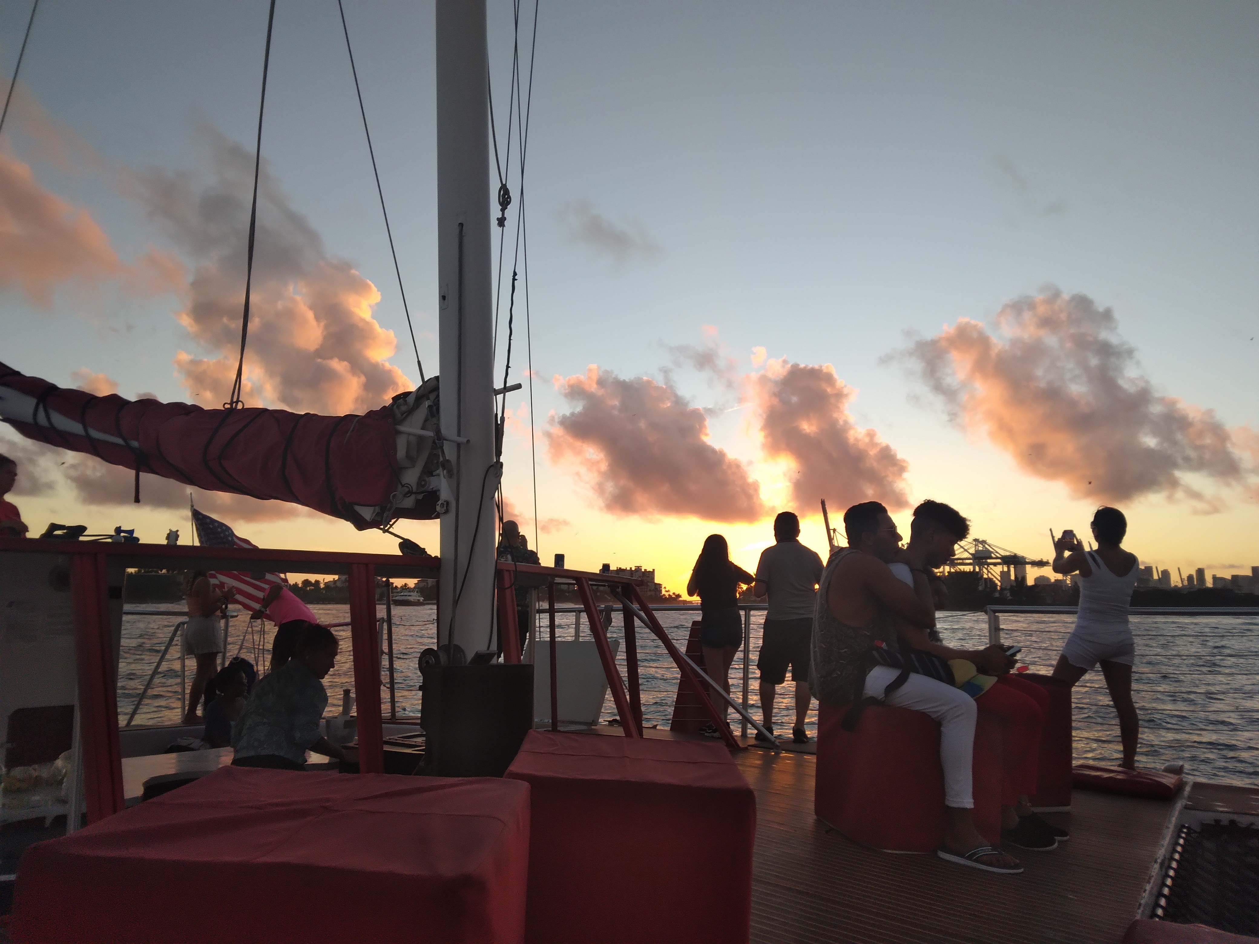 Friends laughing on a catamaran