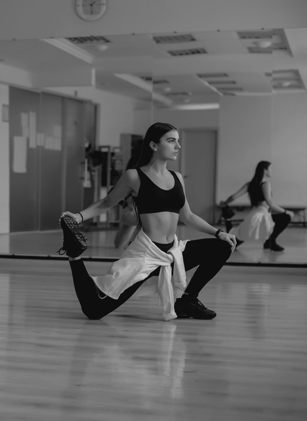 woman stretching in the gym