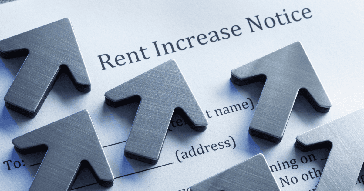 Grey arrows on top of a paper that says "Rent Increase Notice"