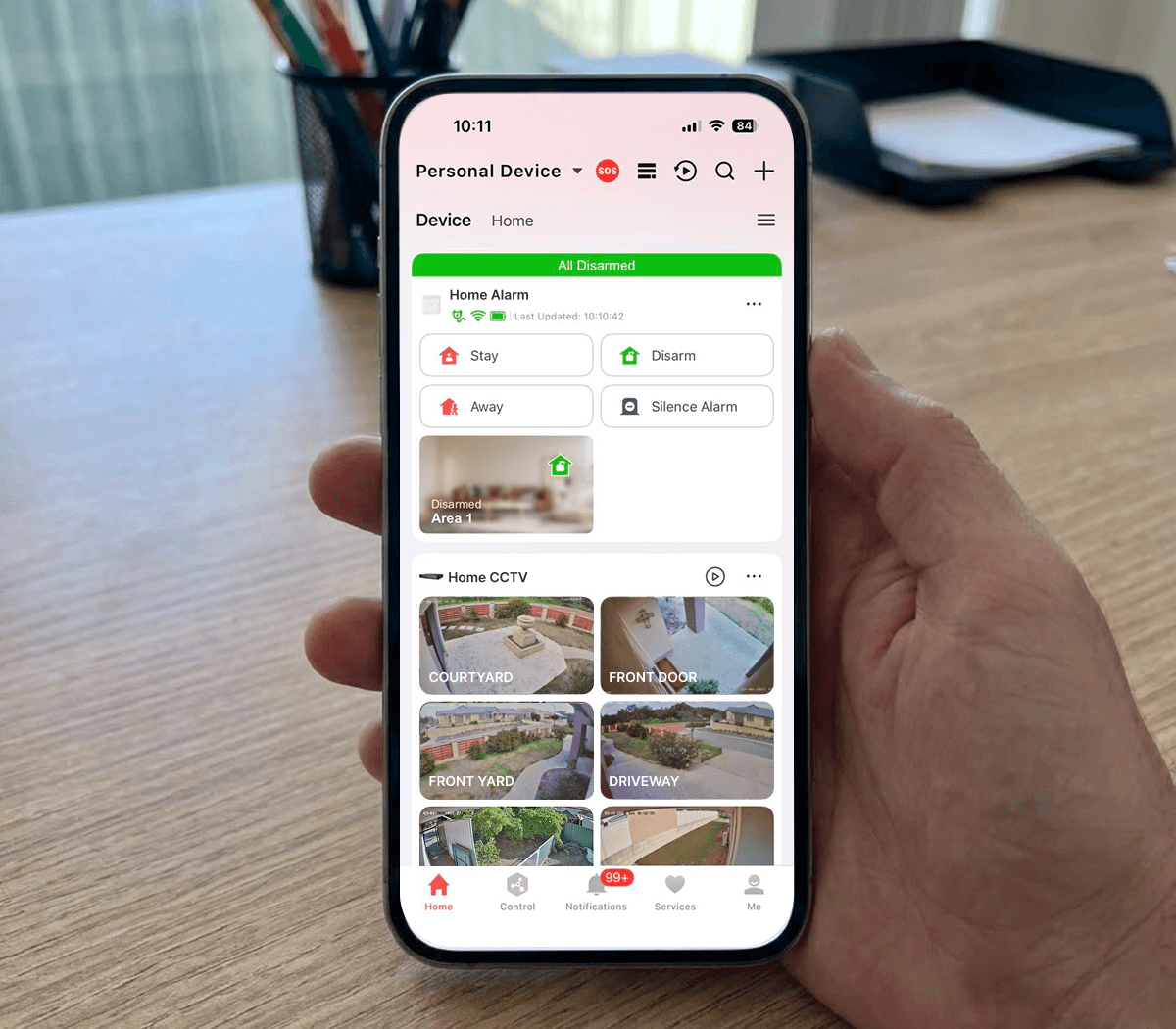 Security system app screen on a phone