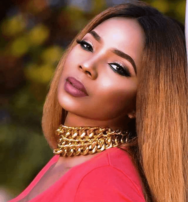 Woman wearing yellow turtleneck sweater.