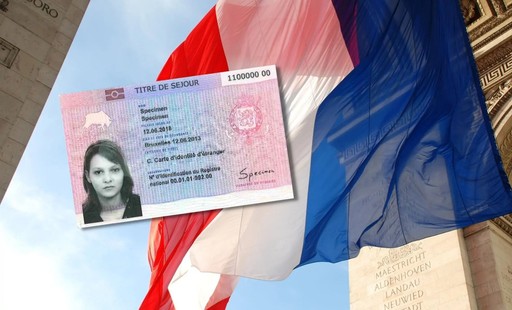 Carte de séjour lying on a french flag