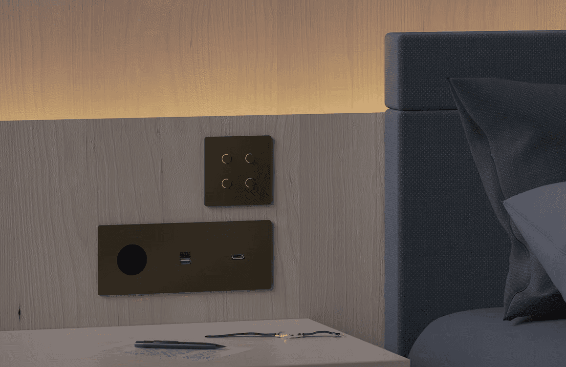 Bedside light switches and USB ports.