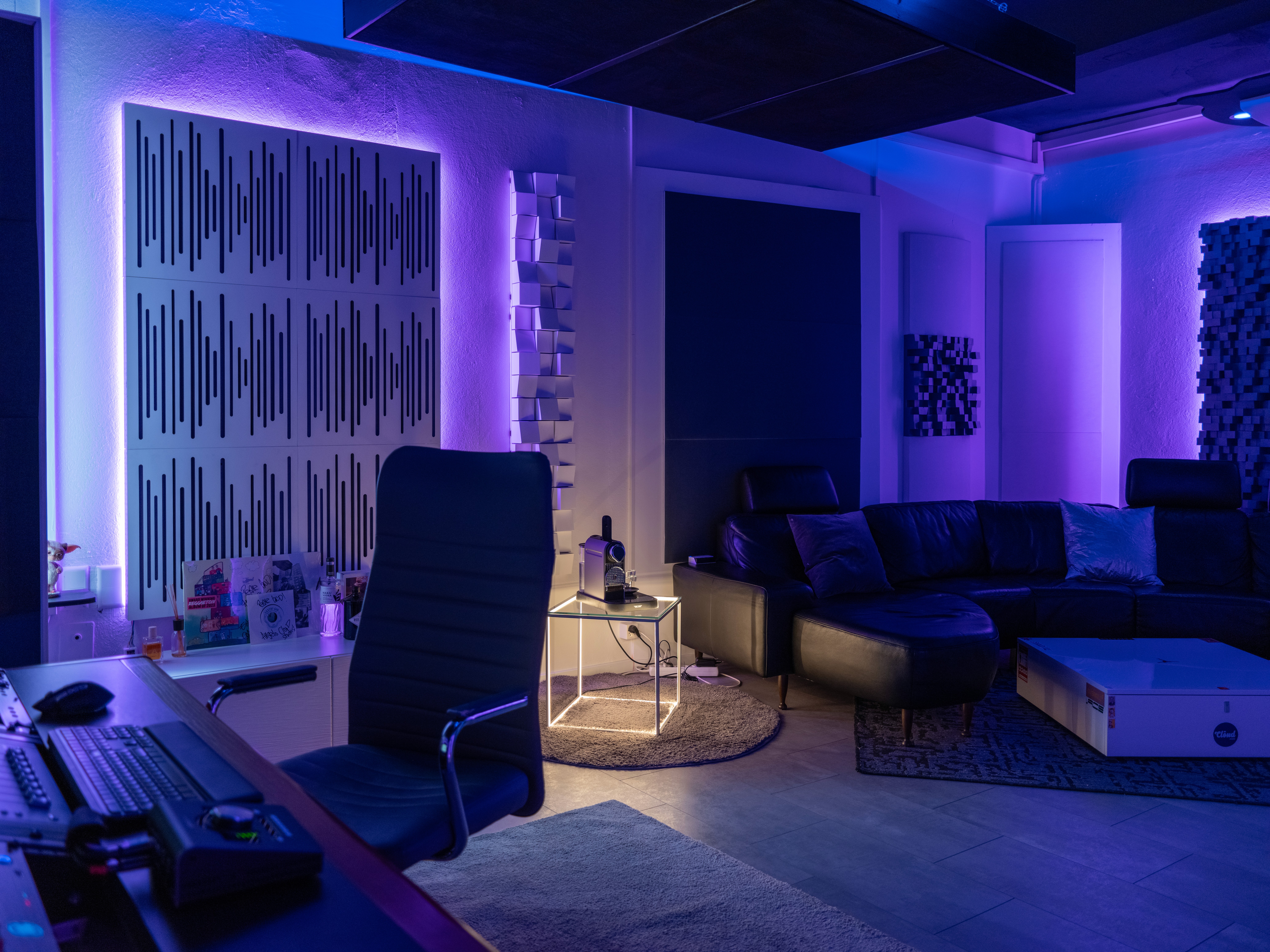 woman in brown long-sleeved top standing beside wall