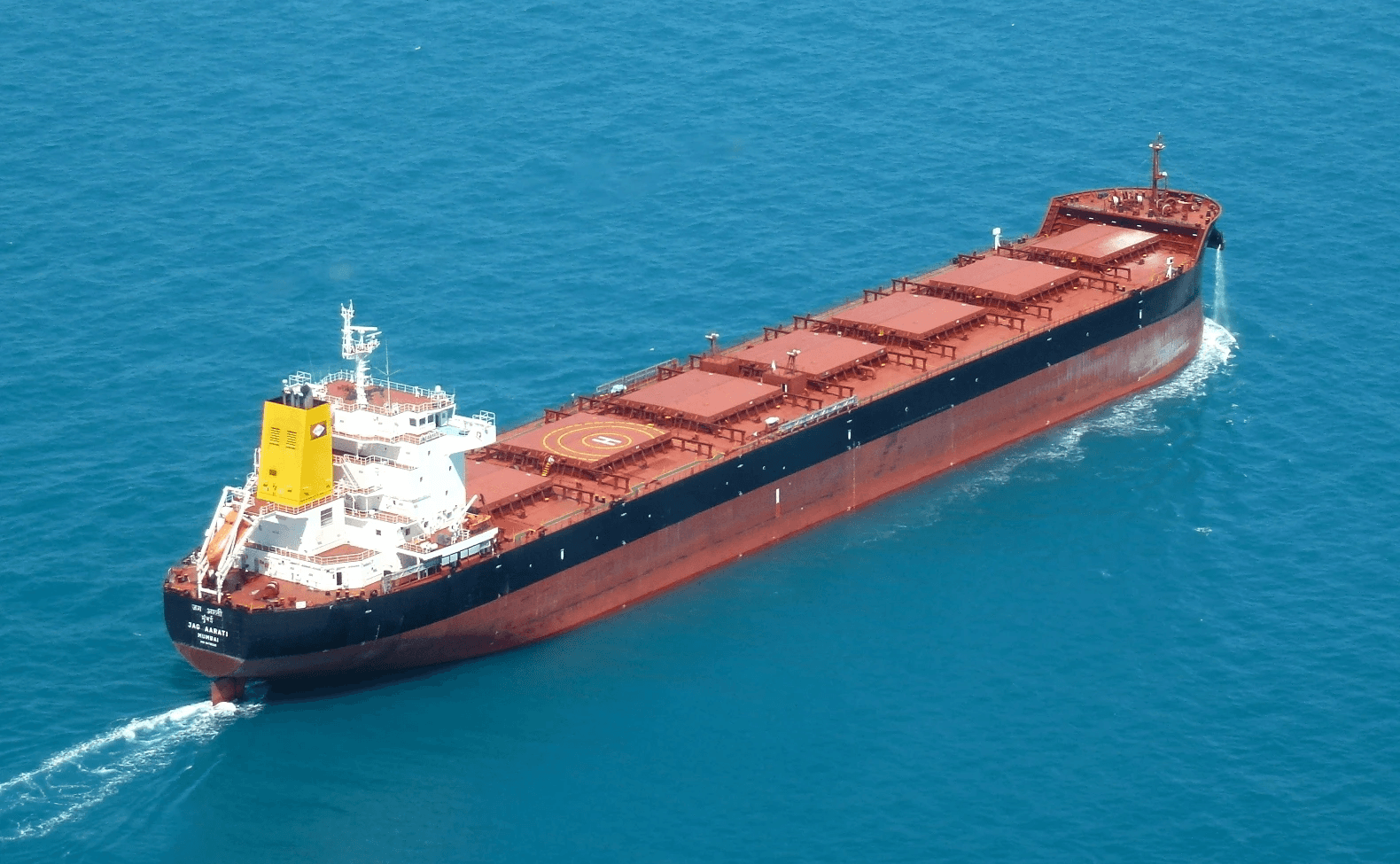 Bulk carrier M/V JAG AARATI (IMO 9478200) underway at sea — 7-hold vessel used in case study for cargo hold cleaning and painting to sugar-loading, hospital-standard finish.