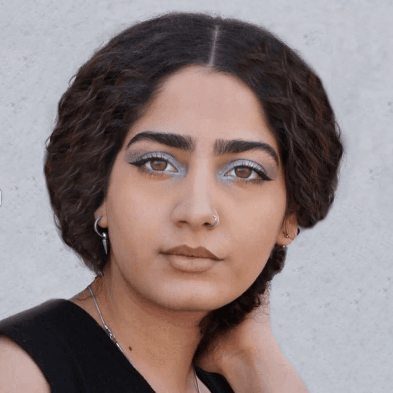 A portrait of a young man smiling