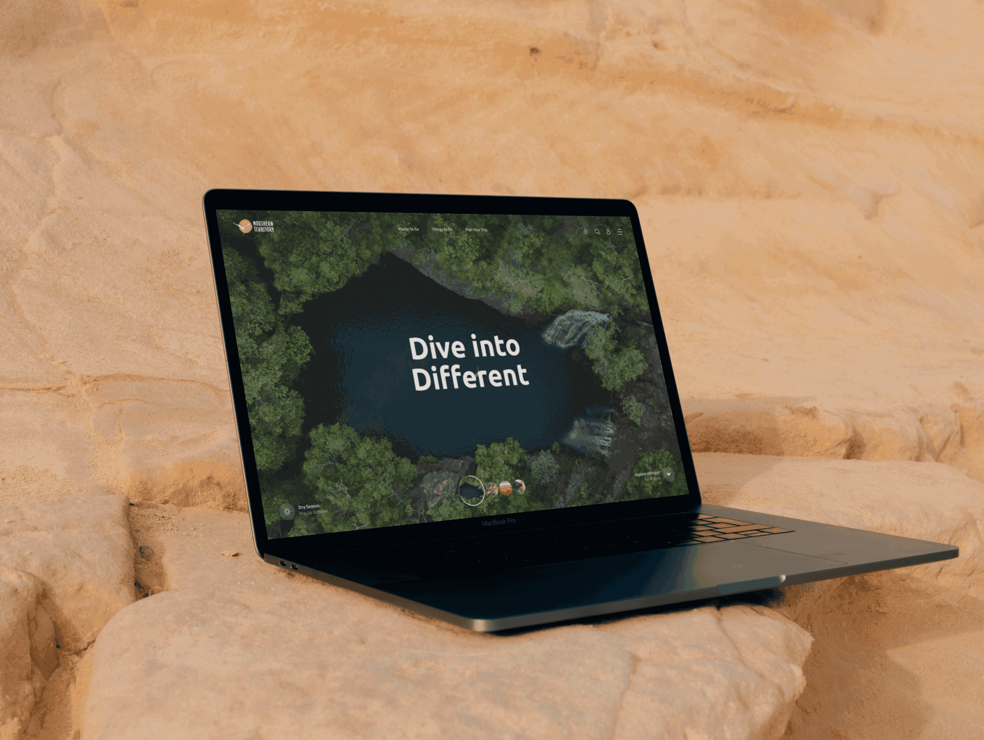 A website concept design for 'NT Tourism' displayed in a laptop.