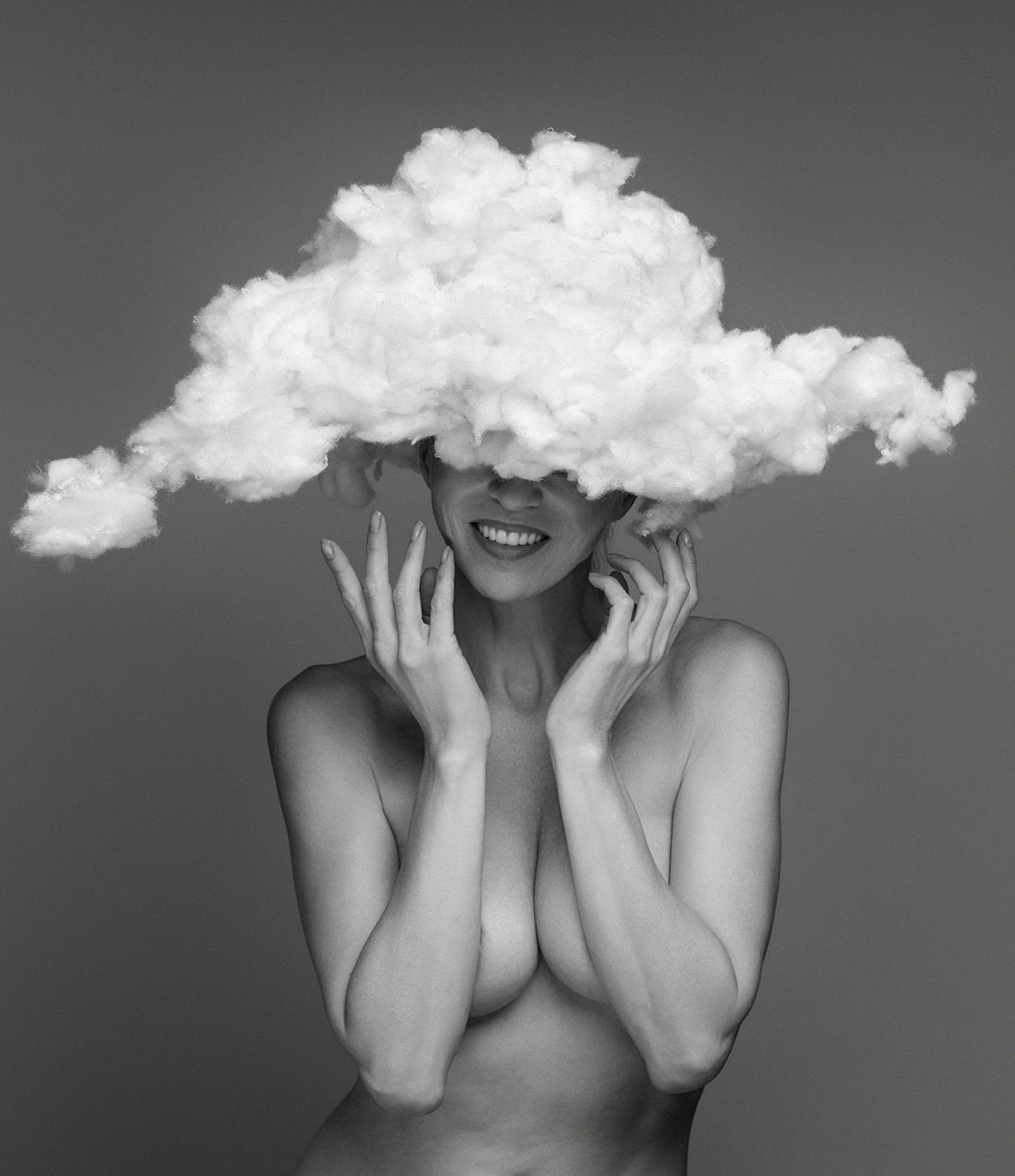 Woman smiling, cloud on her head, grey background, artistic shot - Clouded - Agnieszka Czyzkowska Photography