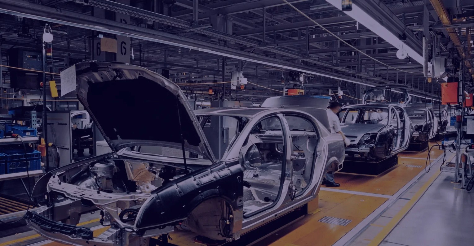image of an automotive construction site with bodies of cars being put together