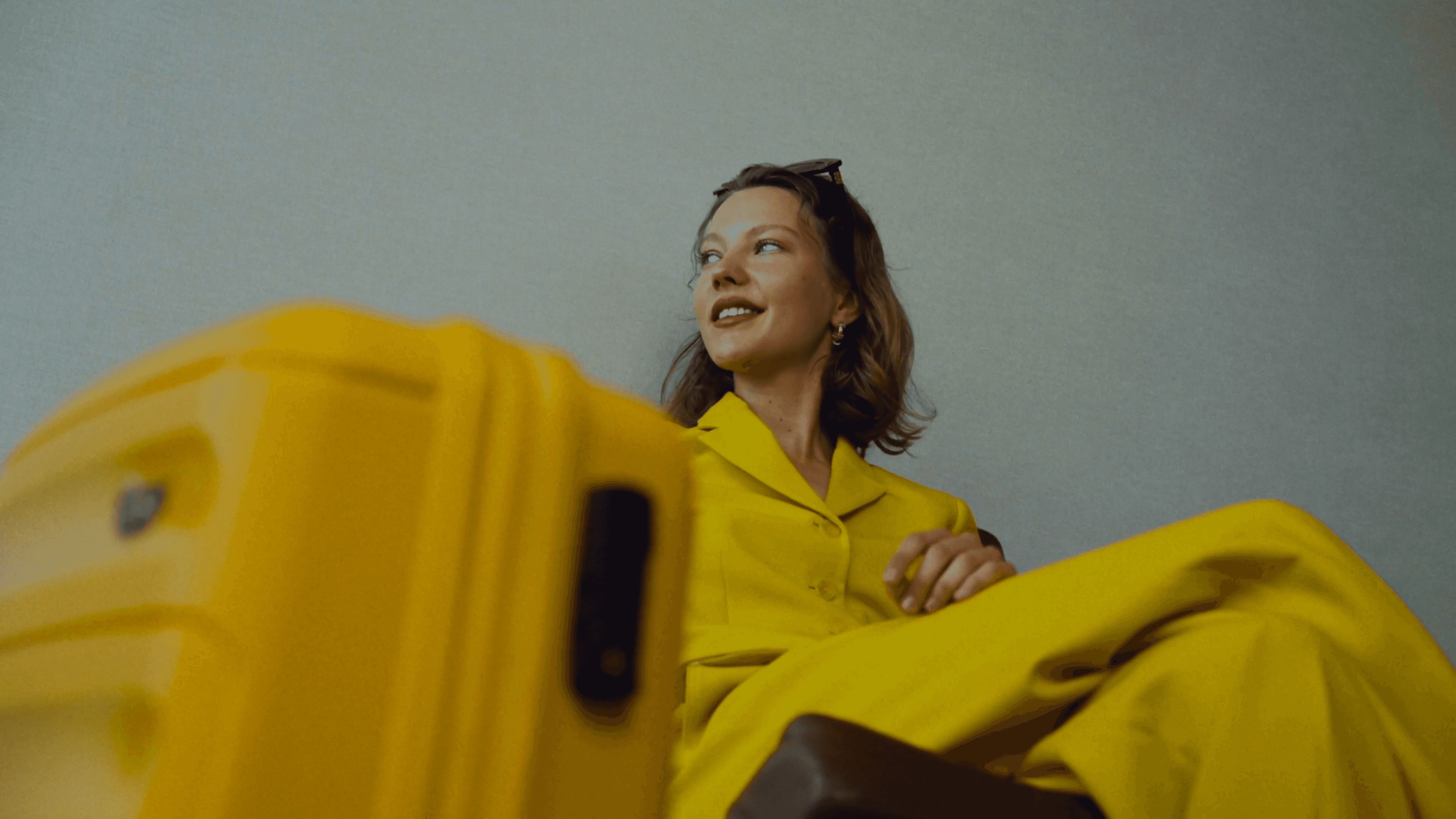 black laptop computer on brown wooden stand