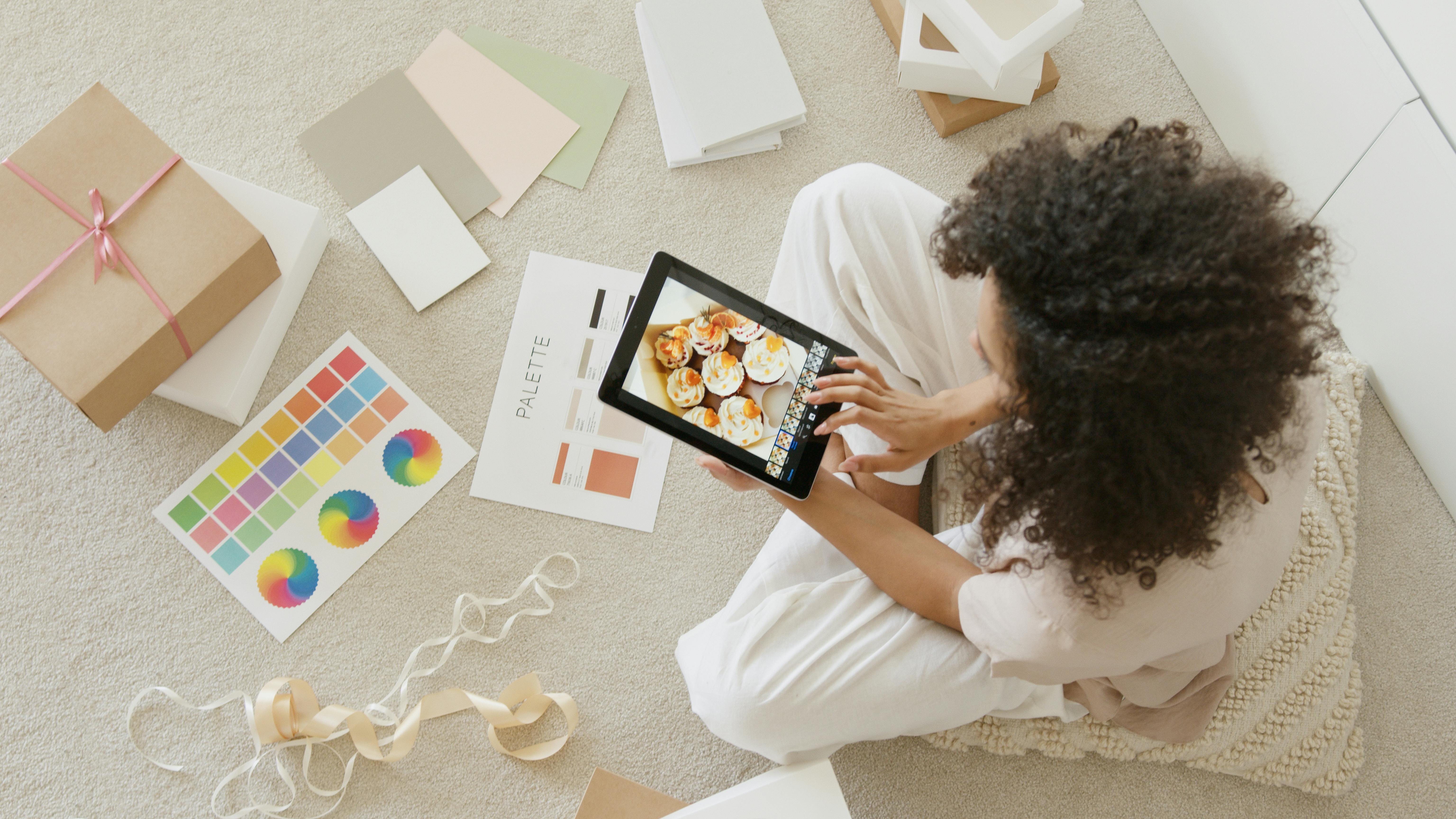 Woman going through a catalog of product shoots