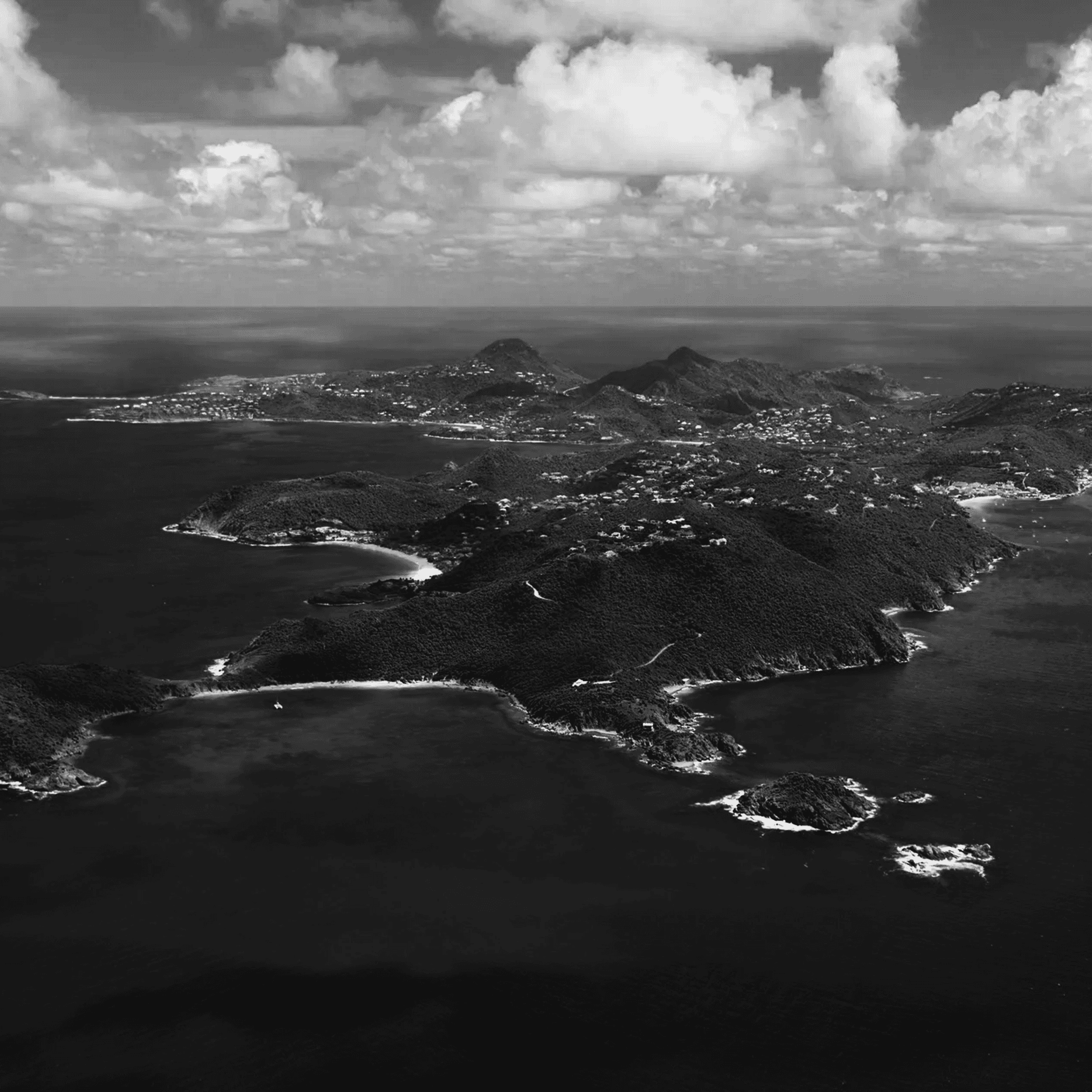 Man meditating in seated yoga pose with eyes closed